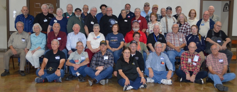 Seated on floor L-R: Roger KE5STR, John W5BWC, George NC5G,  Zogal KB5DBE, Steve KG5VK, Gary KF5JEH,  Lloyd KF5ZHW, Gary WA5FLV
Seated second row L-R:  Bill WA5YPD, Carolyn, Ed KD5CNV, Jim K4HJL, Jo Ann KA5AZK, Nan N5ICH,  Stuart KF5NIX, KF5NIX XYL, Lee W5LHC, Gary WA5VAS, KF5ZHW Granddaughter, Bill K5TTF

Third row L-R:  Roger N5UKJ, Tim K5TGS,  Sheila Lotspeich, Mark N0CAL, Larry N5QGD, Jon KZ5Z, Sheryl K5TTP, Alan N5MSE, Peggy Bradford, Cotton WO5R,  Mary W5MKI, Ron KF5OMH

Fourth row L-R:  Mike KA5HIA, Jim N5FKW,  Pat W7JPK, Deroy AA5R, Martin W5MAN, Jim W5IM,  George KF5QEZ, Mike WA5GED, John N5AUS, Mary , Roy WA5YZD  